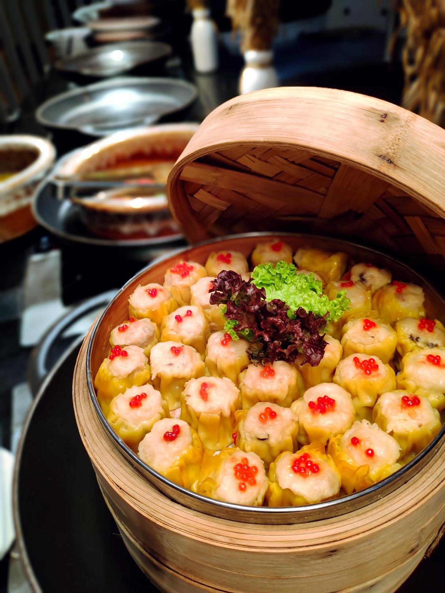 Hilton Petaling Jaya Hotel Exterior foto Dim sum